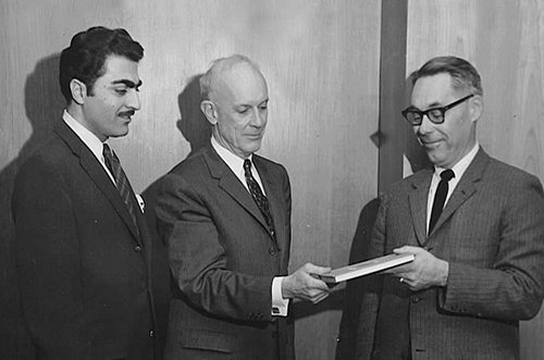 Professor Said with AU’s School of International Service Dean Ernest S. Griffith and Professor Lerche with the first print copy of Concepts of International Politics in 1963. (Photo courtesy of American University.)